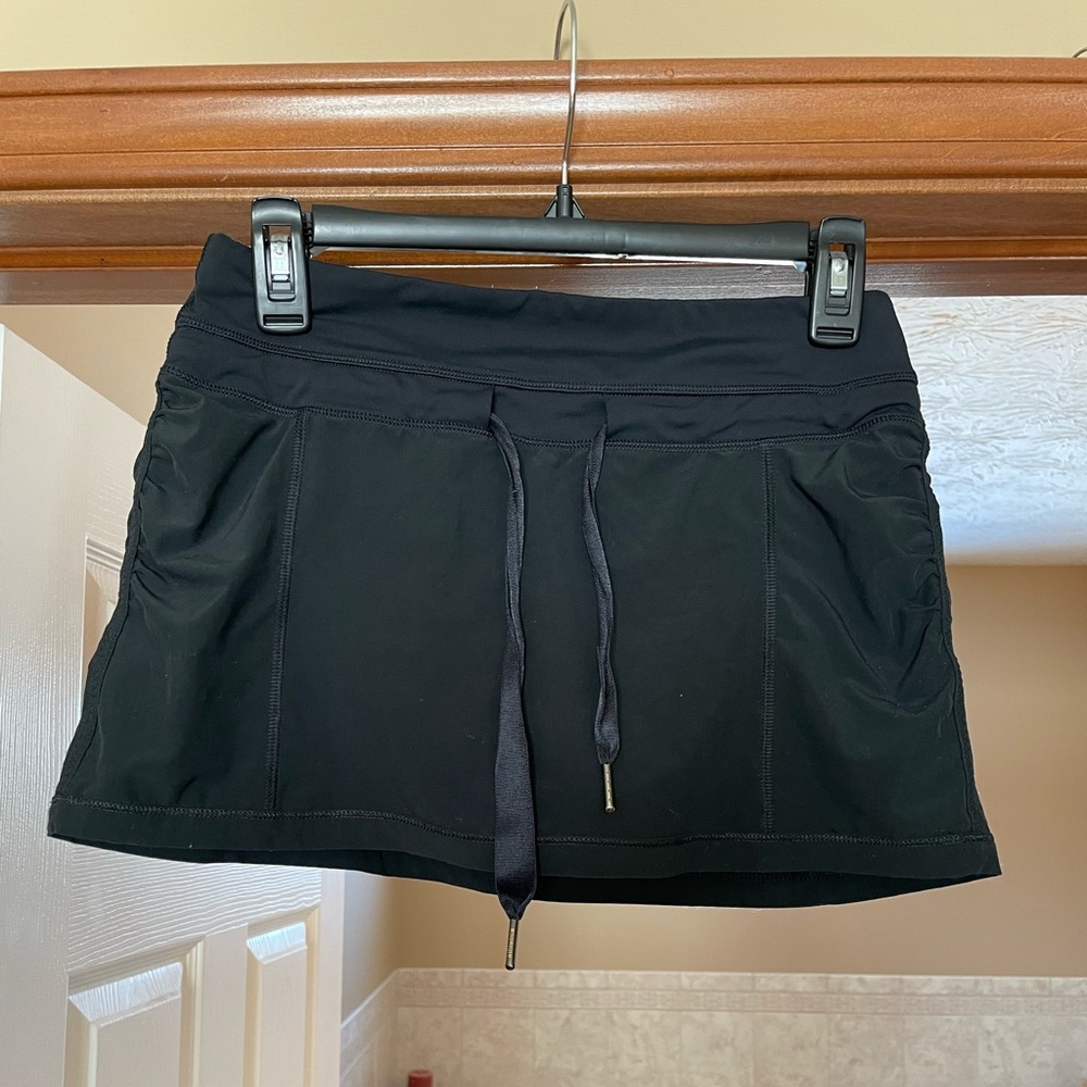 Loved Lululemon black skort size 4